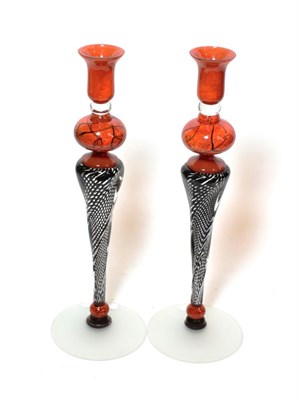 Lot 148 - Mihai Topescu (Romanian) A pair of large art glass candlesticks, signed to base