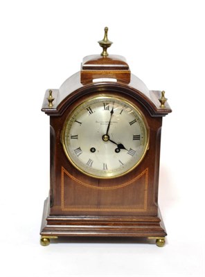 Lot 157 - A mahogany inlaid striking mantel clock, retailed Ollivant & Botsford, Manchester; together...