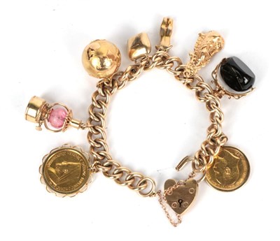 Lot 168 - A charm bracelet stamped '9' '.375, hung with a 1906 sovereign, a swivel fob a Gibraltar charm,...