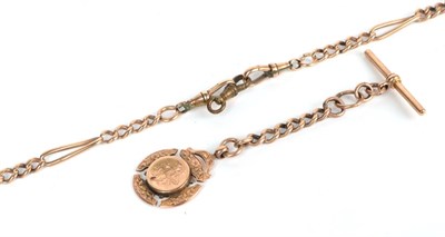 Lot 174 - A figaro link Albert chain each link stamped '3' '.375' (a.f.), with a 9 carat gold T-bar and a...