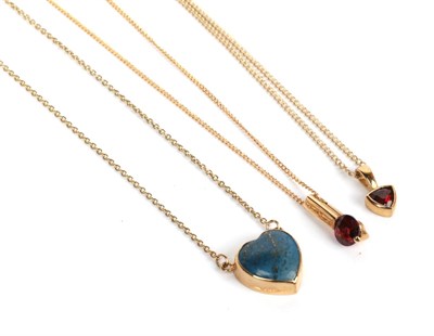 Lot 197 - Two garnet pendants on 9 carat gold chains, chain lengths 41cm and 45cm; and a 9 carat gold...