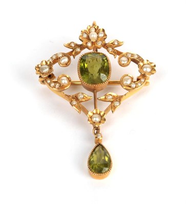 Lot 201 - A peridot and seed pearl brooch/pendant, measures 2.7cm by 4.3cm (a.f.)