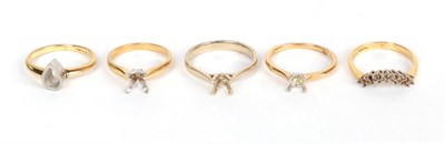 Lot 215 - Five 18 carat gold vacant ring mounts, of various designs and finger sizes (5)