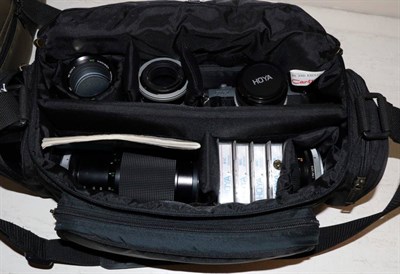 Lot 227 - Canon AV-1 with various lenses including 50mm; 28mm; 135mm; 75-205mm