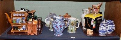 Lot 238 - ^ A shelf of modern Rington's china including teapots; Willow pattern blue and white china; a...