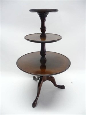 Lot 1218 - A Georgian Style Mahogany Piano Waiter, in the form of a three-tier dumb waiter with turned columns