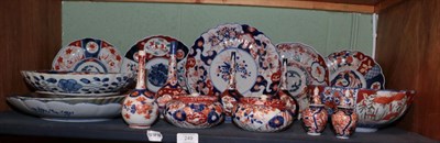 Lot 249 - A quantity of 19th century and later Imari vases, plates and bowls