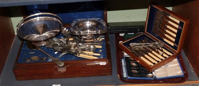 Lot 256 - Six cased silver teaspoons, three silver forks, silver sugar tongs and a group of silver plated...