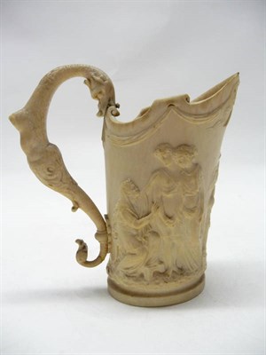 Lot 1226 - A Carved Elephant Ivory Jug in Renaissance Revival Style, Dieppe, circa 1850, of helmet form,...