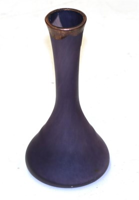 Lot 361 - Mihai Topescu (Romanian) A frosted purple art glass vase with metallic rim