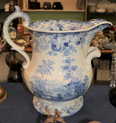 Lot 366 - ^ A 19th century blue and white Swiss scenery patterned water jug, 41cm high