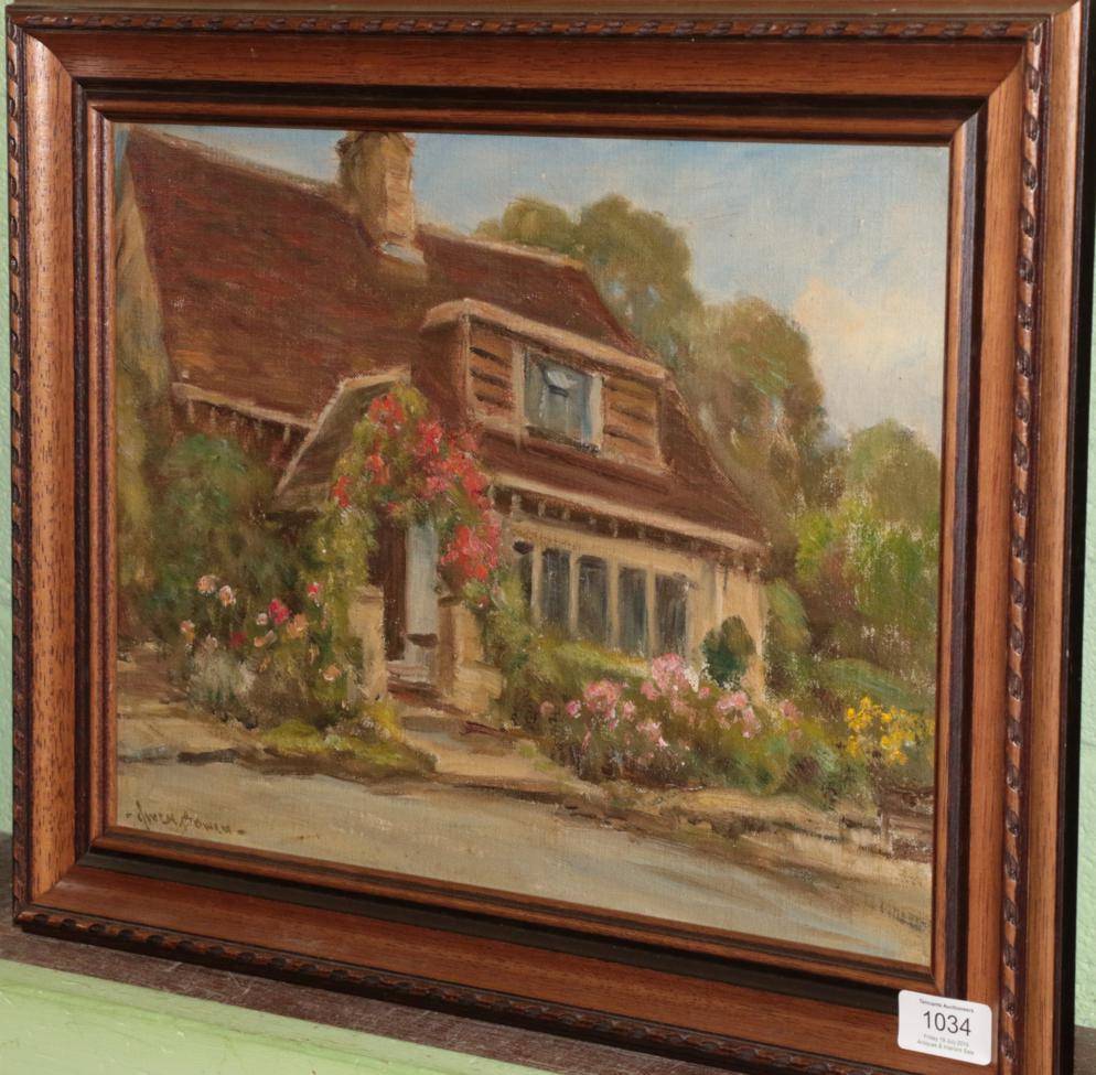 Lot 1034 - Owen Bowen (1873-1967) Country cottage with garden in full bloom, signed, oil on board, 29cm by...