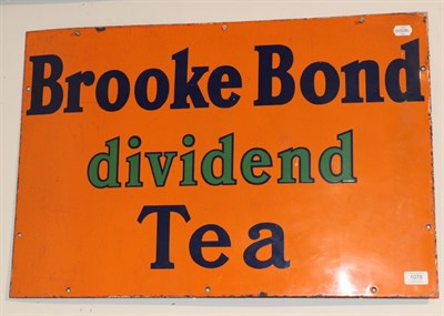 Lot 1078 - ^ A single sided enamel advertising sign, Brookbonde Dividend Tea, 50cm by 76cm