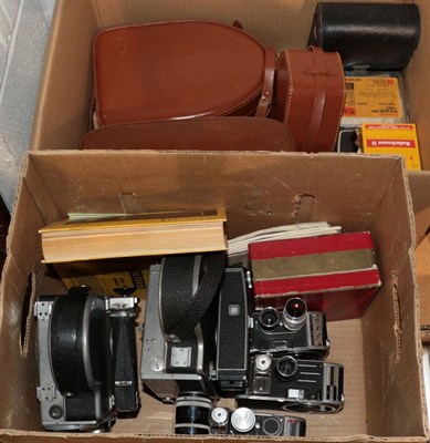 Lot 1132 - Two boxes of Bolex Cine cameras, some with lenses and cases