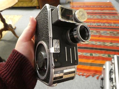 Lot 1132 - Two boxes of Bolex Cine cameras, some with lenses and cases
