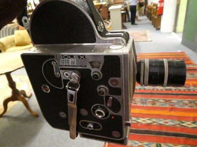 Lot 1132 - Two boxes of Bolex Cine cameras, some with lenses and cases