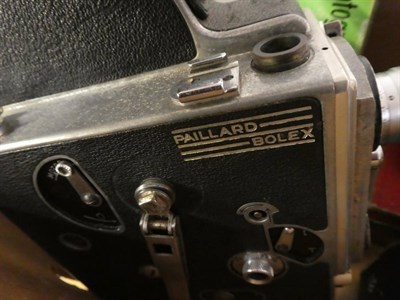 Lot 1132 - Two boxes of Bolex Cine cameras, some with lenses and cases