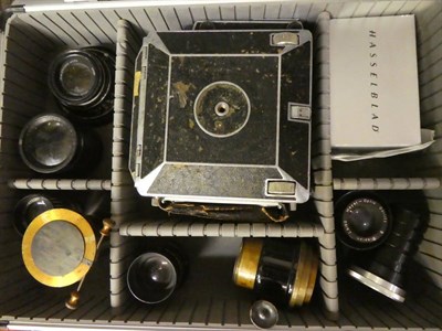 Lot 1140 - A cased Linhof field camera with Ross and various lenses, camera case