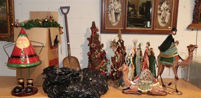 Lot 1144 - ^ A quantity of Christmas decorations including seven metal candle/card holders; a Santa Claus...