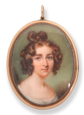 Lot 1247 - English School, circa 1820: Portrait Miniature of a Young Woman, with curly brown hair and blue...