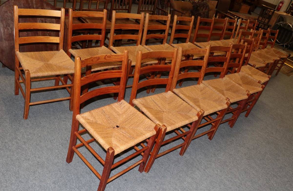 Lot 1190 - Twenty pine rope work seated ladder back chairs