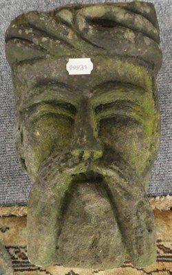 Lot 1193 - A carved stone mask, probably medieval, 26cm high; and a later carved stone support in the form...