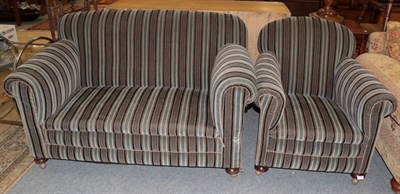 Lot 1207 - An Edwardian drop arm sofa and chair (2)