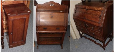 Lot 1214 - ^ A late Victorian mahogany pot cupboard; an oak bureau with geometric moulding; and a ladies...