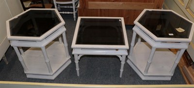 Lot 1224 - A pair of reproduction hexagonal shaped glass topped tables and a matching side table