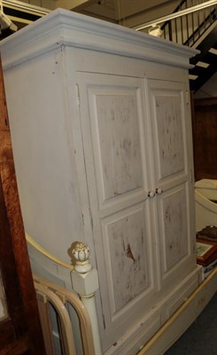 Lot 1227 - White painted pine wardrobe, the base fitted two drawers