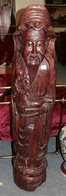 Lot 1231 - ^ A Japanese carved hardwood figure, 160cm high