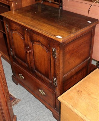 Lot 1257 - Oak television cabinet, possibly Titchmarsh & Goodwin