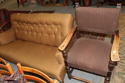 Lot 1259 - Elm framed part upholstered elbow chair, together with a button back sofa (2)