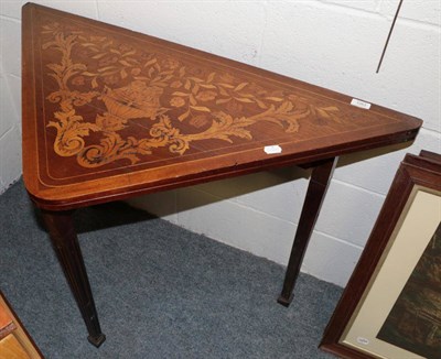 Lot 1263 - A 19th century Dutch mahogany and marquetry inlaid fold over card table, on square fluted legs...