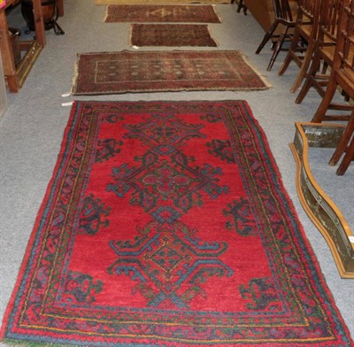 Lot 1268 - Ushak rug, the crimson field with three linked medallions enclosed by narrow borders, 200cm by...