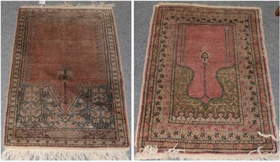 Lot 1273 - A Kayseri prayer rug, the coral pink field beneath the Mihrab, enclosed by narrow borders, 90cm...