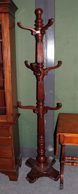 Lot 1284 - A Victorian style coat and hat rack purchased form Jonathan Charles Fine Furniture