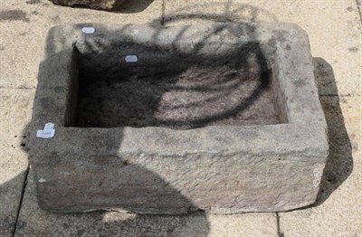 Lot 1289 - A rectangular stone garden trough, 63cm wide