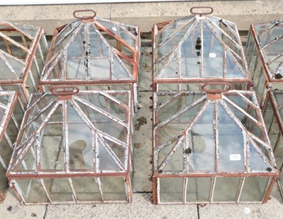 Lot 1292 - ^ Four late 19th century/early 20th century glazed hand lights, with removable covers, 45cm by 45cm