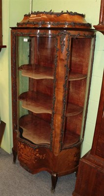 Lot 1315 - ^ A late 19th century French rosewood and marquetry inlaid vitrine with staged top, 85cm wide