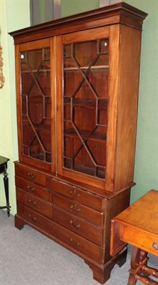 Lot 1318 - A George III mahogany bookcase/chest, possibly a marriage, 124cm wide