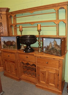 Lot 1324 - ^ A pine kitchen dresser and rack of inverted breakfront form, 188cm wide