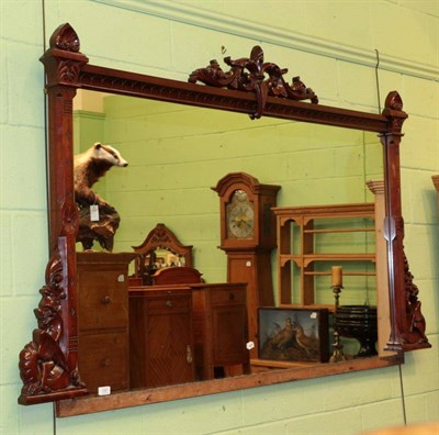 Lot 1327 - ^ A late Victorian mahogany overmantle mirror, formerly the top section of a sideboard, 199cm wide