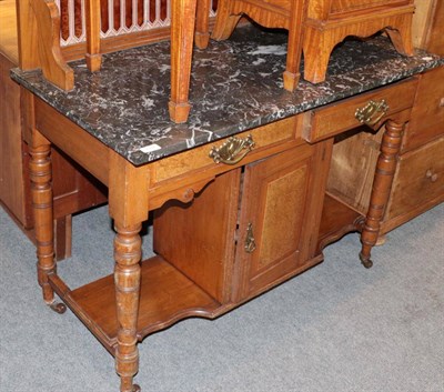 Lot 1337 - ^ A late Victorian tile back marble top washstand, 107cm wide