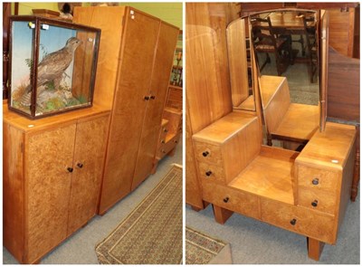 Lot 1339 - A three piece bedroom suite comprising double door wardrobe; linen chest and a dressing table (3)