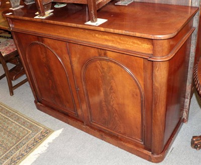 Lot 1343 - A Victorian mahogany sideboard with moulded drawer and two arched moulded cupboard doors, 137cm...