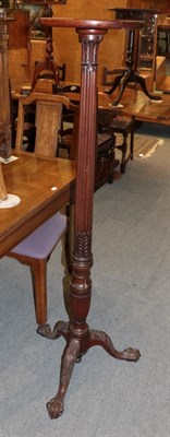 Lot 1354 - An early 20th century carved mahogany plant stand