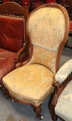 Lot 1379 - A Victorian walnut nursing chair