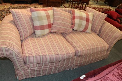 Lot 1386 - A modern two seater sofa with striped loose cover, 222cm wide