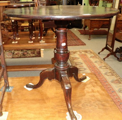 Lot 1394 - An oak George III and later tripod table